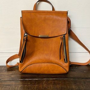 Beautiful deep camel colored leather bag. Back pack bag. Like new!